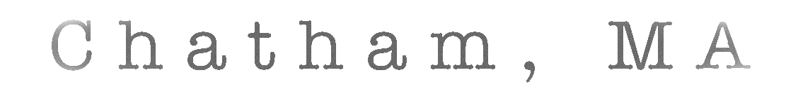 Close-up of a textured gray letter 'a' on a white background.